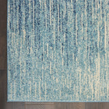 6' Ivory And Blue Abstract Power Loom Runner Rug