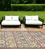 7' X 9' Ivory And Blue Southwestern Stain Resistant Indoor Outdoor Area Rug