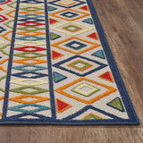 7' X 9' Ivory And Blue Southwestern Stain Resistant Indoor Outdoor Area Rug