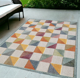 5' X 7' Orange And Ivory Geometric Stain Resistant Indoor Outdoor Area Rug