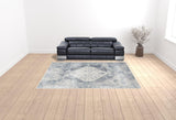 9' x 12' Blue and Ivory Oriental Power Loom Distressed Area Rug