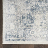 9' x 12' Blue and Ivory Oriental Power Loom Distressed Area Rug