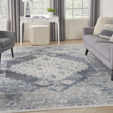 9' x 12' Blue and Ivory Oriental Power Loom Distressed Area Rug