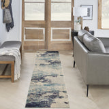 9' x 12' Ivory Abstract Power Loom Area Rug