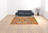 9' x 12' Gold Floral Power Loom Area Rug