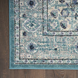 5' x 7' Aqua Floral Power Loom Distressed Area Rug