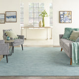 5' x 7' Aqua Floral Power Loom Distressed Area Rug