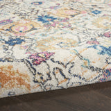 5' x 7' Cream Floral Power Loom Distressed Area Rug