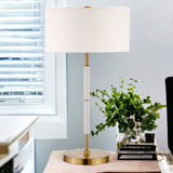 25" Gold and White Metal Two Light Table Lamp With White Drum Shade