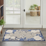 8' Blue and Orange Round Floral Power Loom Area Rug