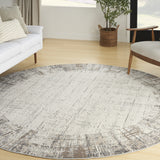 8' Ivory Round Abstract Power Loom Area Rug