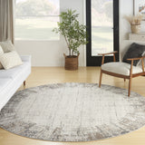 8' Ivory Round Abstract Power Loom Area Rug