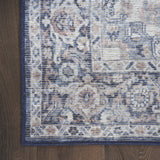 5' X 7' Blue And Pink Floral Power Loom Distressed Washable Area Rug