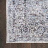 5' X 7' Blue And Pink Floral Power Loom Distressed Washable Area Rug