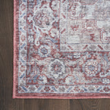 8' X 10' Blue And Pink Floral Power Loom Distressed Washable Area Rug