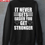 It Never Gets Easier You Get Stronger Unisex T-Shirt